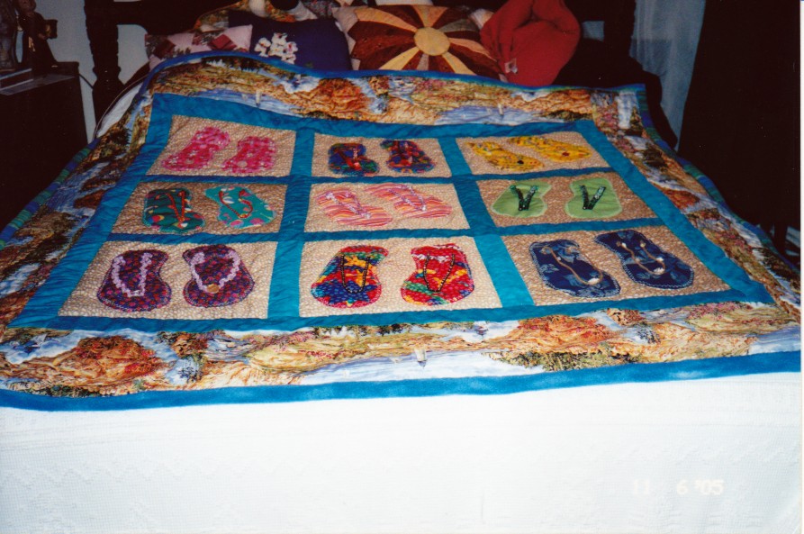 A quilt that Maria sewed for her grand daughter